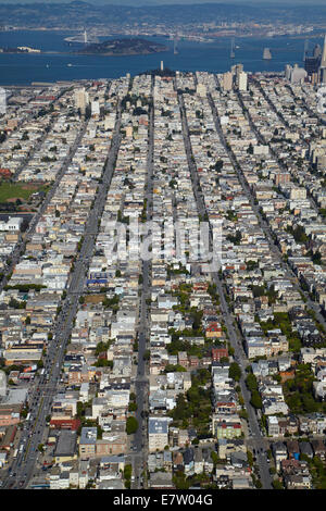 Lombard Street (larger street at left), Cow Hollow neighborhood, San Francisco, California, USA - aerial Stock Photo