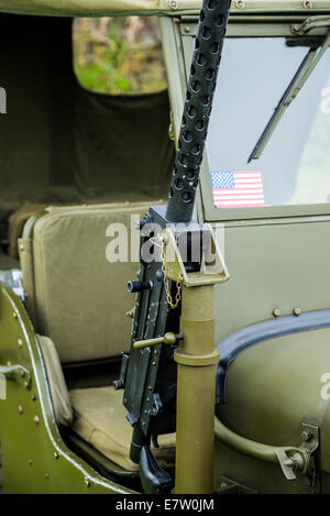 Machine gun mounted onto WW2 army jeep on display at car show in Derbyshire England Stock Photo