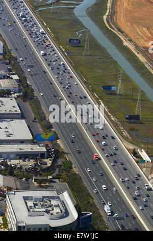 Traffic on Bayshore Freeway ( U.S. Route 101), San Carlos, San Francisco, California, USA - aerial Stock Photo