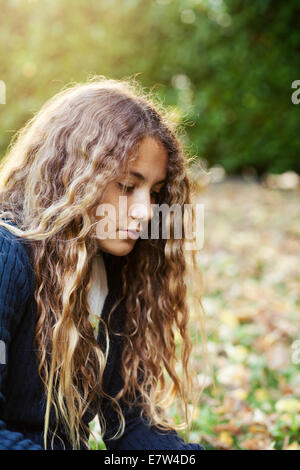 Pensive teenager girl Stock Photo