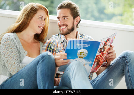 Couple relaxing indoors Stock Photo