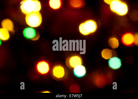 Christmas holiday background from color unfocused lights Stock Photo