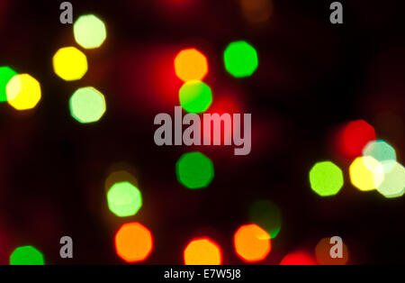 Christmas holiday background from color unfocused lights Stock Photo