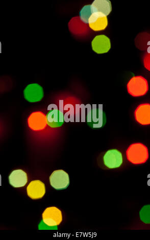 Christmas holiday background from color unfocused lights Stock Photo