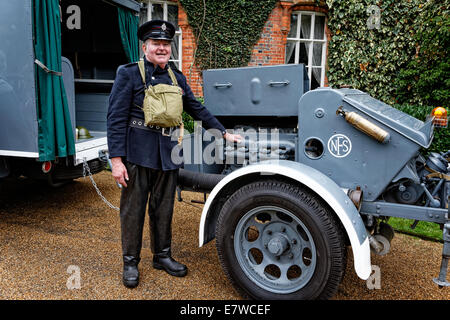 David White (owner) AFS Fireman with Trailer Pump attached to 1942 Austin K2 Auxilliary Towing Vehicle Stock Photo