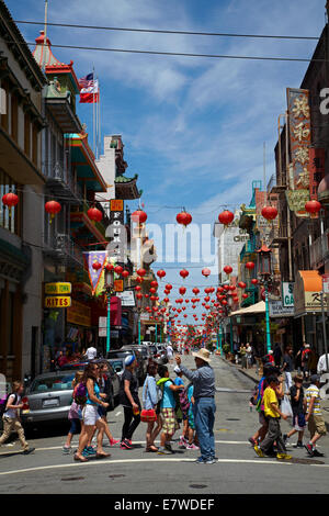 People crossing Grant Avenue, Chinatown, San Francisco, California, USA Stock Photo