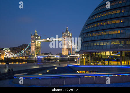 Twilight over City Hall and More London Development on the South Bank, with the Tower Bridge beyond, London England, UK Stock Photo