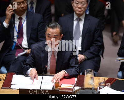 New York, USA. 24th Sep, 2014. Chinese Foreign Minister Wang Yi attends a UN Security Council summit on terrorism in New York, Sept. 24, 2014. Wang Yi on Wednesday called on the international community to come up with 'new thinking and new steps' in its response to terrorism. Credit:  Yin Bogu/Xinhua/Alamy Live News Stock Photo
