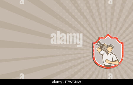 Business card showing illustration of a cameraman movie director holding vintage movie film camera on shoulder set inside shield crest on isolated background viewed from side done in cartoon style. Stock Photo