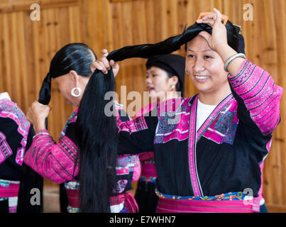 Long Hair Yao women wearing traditional clothing. Stock Photo