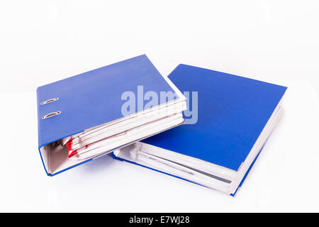 Stack of blue office folders, isolated on white background. Stock Photo