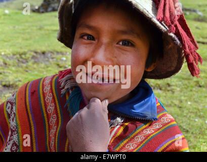 Young boy wearing traditional costume, Andes, near Cusco, Peru Stock Photo