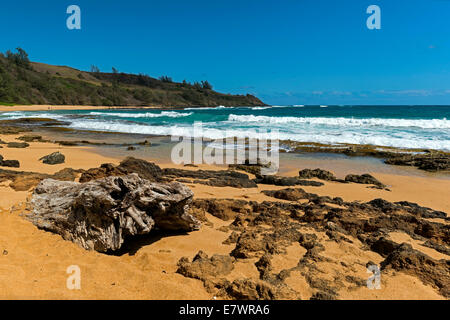 Boulders on the beach, Moloaa Bay, Anahola, Kaua'i, Hawaii, United States Stock Photo