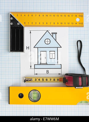 development drawings and tools on graph paper Stock Photo