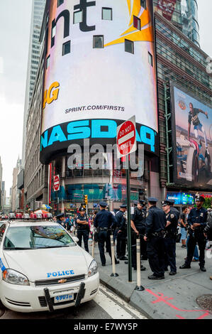 Police ensure security for the millions of visitors to Times Square New York Stock Photo