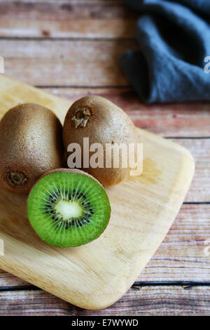 Juicy kiwi on chopping, healthy food Stock Photo