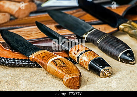 Huntings knife with decorative handles, exposed for sale. Stock Photo