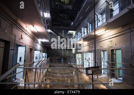 Berlin, Germany. 25th Sep, 2014. The doors of the prison cells of the former Keibelstrasse prison are open in Berlin, Germany, 25 September 2014. The prison in the former East-Berlin police headquarters near Alexanderplatz square lies empty since about twenty years and is usually closed for the public. Credit:  dpa picture alliance/Alamy Live News Stock Photo