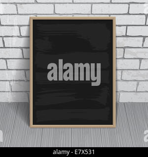 Black chalkboard with wooden frame on brick wall background. Raster version. Stock Photo