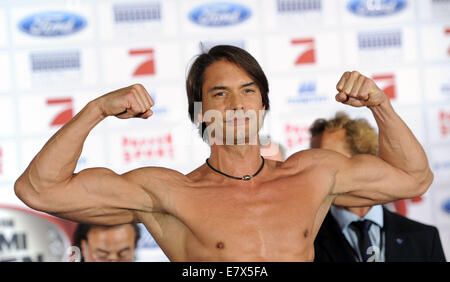 Dusseldorf, Germany. 25th Sept, 2014.   Model Marcus Schenkenberg poses during the weigh-in prior to the event 'Promiboxen' (lit. celebrity boxing) of German TV channel ProSieben in Duesseldorf, Germany, 25 September 2014. Celebrities fight each other in the boxing ring on 27 September 2014. Credit:  dpa picture alliance/Alamy Live News Stock Photo