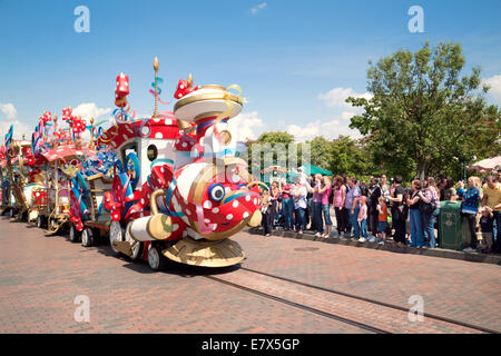 Tourists in Disneyland Paris watching the Disney Parade, Disneyland Paris, France Europe Stock Photo