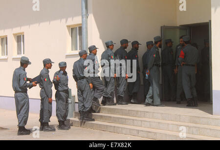 Balkh, Afghanistan. 23rd Sep, 2014. Afghan policemen line up before entering their classes at a police training center in Balkh province, north Afghanistan, on Sept. 23, 2014. © Azorda/Xinhua/Alamy Live News Stock Photo