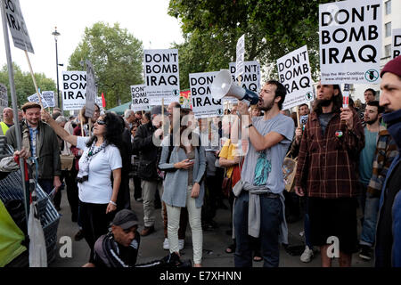 Protesters against UK involvement in bombing ISIS in Iraq and Syria, shout slogans, central London. Stock Photo