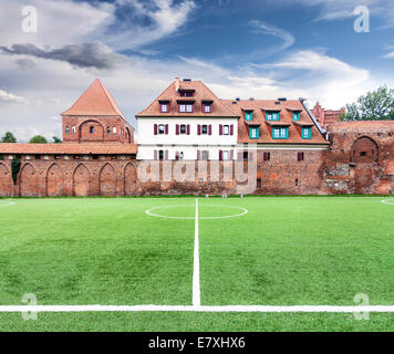View of old part of city from a football field. Stock Photo