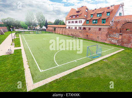 Football field in an old part of city. Stock Photo
