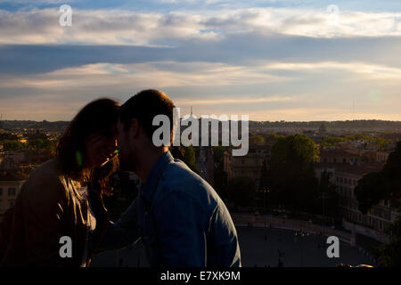 Rome, Italy, 04 May, 2014:  Two lovers kiss in rome Stock Photo