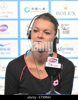 Beijing, China. 26th Sep, 2014. Poland's tennis player Agnieszka Radwanska attends the 2014 China Open press conference in Beijing, capital of China, Sept. 26, 2014. Credit:  Li Wen/Xinhua/Alamy Live News Stock Photo