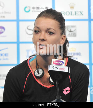 Beijing, China. 26th Sep, 2014. Poland's tennis player Agnieszka Radwanska attends the 2014 China Open press conference in Beijing, capital of China, Sept. 26, 2014. Credit:  Li Wen/Xinhua/Alamy Live News Stock Photo