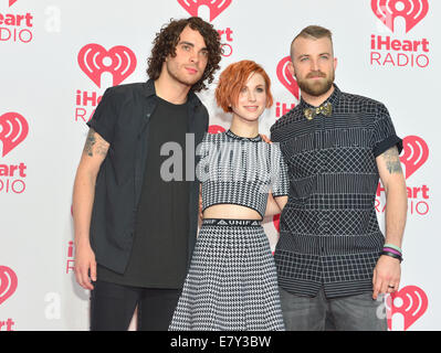 Members of the rock band Paramore attends the 2014 iHeartRadio Music Festival in Las Vegas Stock Photo