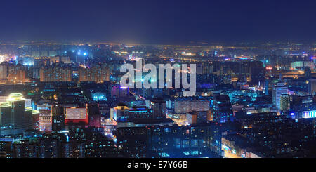 Beijing at night aerial view with urban buildings. Stock Photo