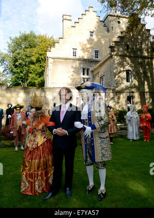 Andre Rieu and performers in Venetian costumes pose in the inner ...