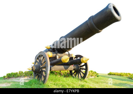 Cannon on wheels moving in grass. Thailand's ancient weapons on white background