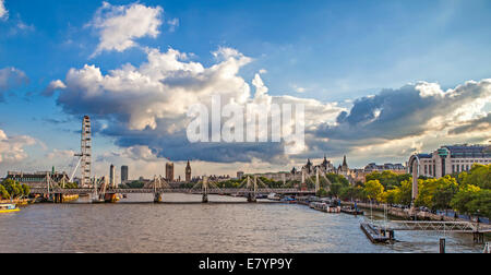 View of London, Hungerford Bridge, Golden Jubilee Bridges, Big Wheel, City of Wesminster. Stock Photo