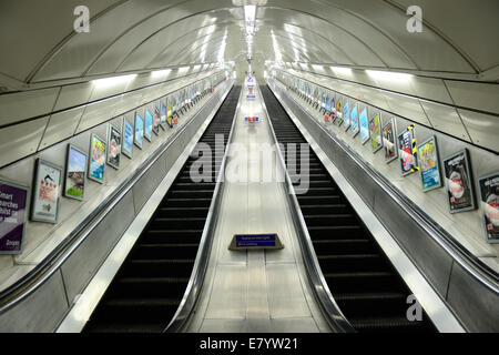 LONDON, UK - SEP 27: London Underground station interior on September 27, 2013 in London, UK. The system serves 270 stations, 402 kilometers of track with operation history of 150 years Stock Photo