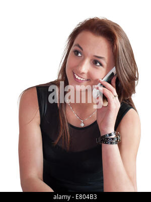 Beatiful, smiling girl talking with a mobile phone Stock Photo