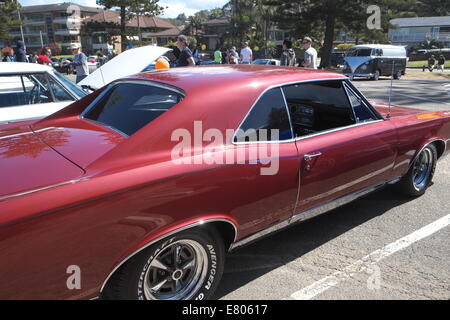 Newport Beach, Sydney, Australia. 27th Sep, 2014. Classic cars on display at Sydney's Newport Beach. Here a 1967 Pontiac GTO hardtop. Credit:  martin berry/Alamy Live News Stock Photo