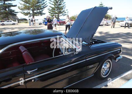 Newport Beach, Sydney, Australia. 27th Sep, 2014. Classic cars on display at Sydney's Newport Beach. Here a black Ford Falcon. Credit:  martin berry/Alamy Live News Stock Photo