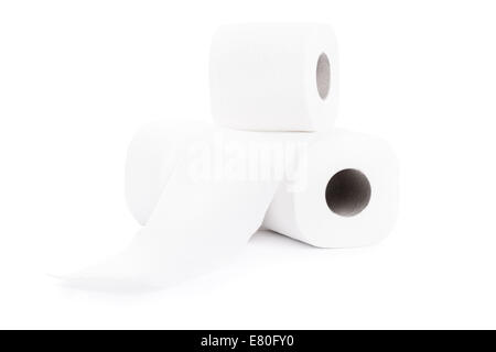 Close up shot of three blank rolls of toilet paper, isolated on white background. Stock Photo