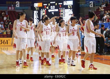 Incheon, South Korea. 28th Sep, 2014. Athletes of China react after the women's quarterfinal of basketball against Kazakhstan at the 17th Asian Games in Incheon, South Korea, Sept. 28, 2014. China won 71-57. Credit:  Meng Yongmin/Xinhua/Alamy Live News Stock Photo