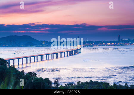 Sunset coast with Shenzhen bridge in Hong Kong Stock Photo