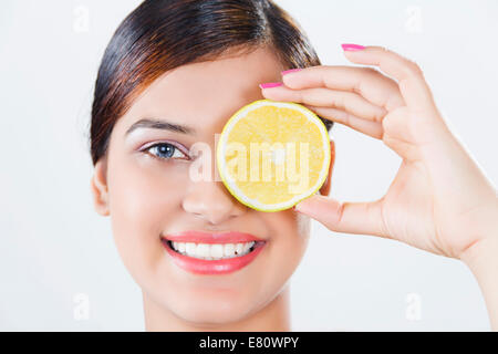 indian Beautiful Ladie Hiding Face  Orange Stock Photo