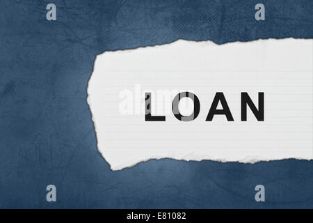 financial loan with white paper tears on blue texture Stock Photo