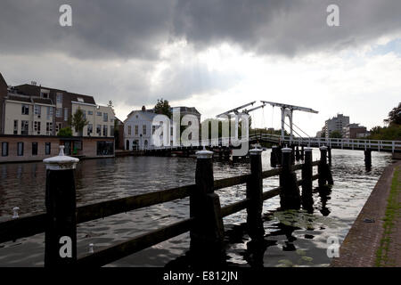 Rembrandtbrug over the galgewater in the city of Leiden, Netherlands with cloudy weather Stock Photo