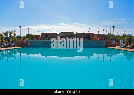 Horizontal view of an empty swimming pool at a plush hotel. Stock Photo