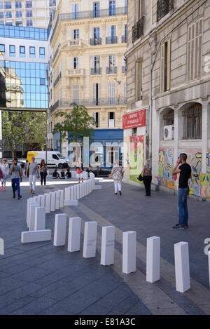 Giant Domino Circuit, Marseille, France. 28th Sep, 2014. Marseille, has been the latest setting for a mammouth domino circuit linking the city's main train station to the old port. The brain-child of British artist Julian Maynard Smith, of Station Opera House, the installation follows similar events in London, Copenhagen, Helsinki and elsewhere Credit:  Chris Hellier/Alamy Live News Stock Photo
