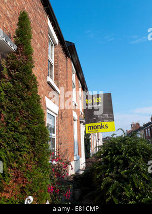 Estate Agent Monks 'To Let' sign on a house in Shrewsbury England, UK  KATHY DEWITT Stock Photo